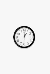 black and white round analog wall clock at 10 10