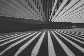 A striking architectural visual composition highlighting light and shadow interplay.