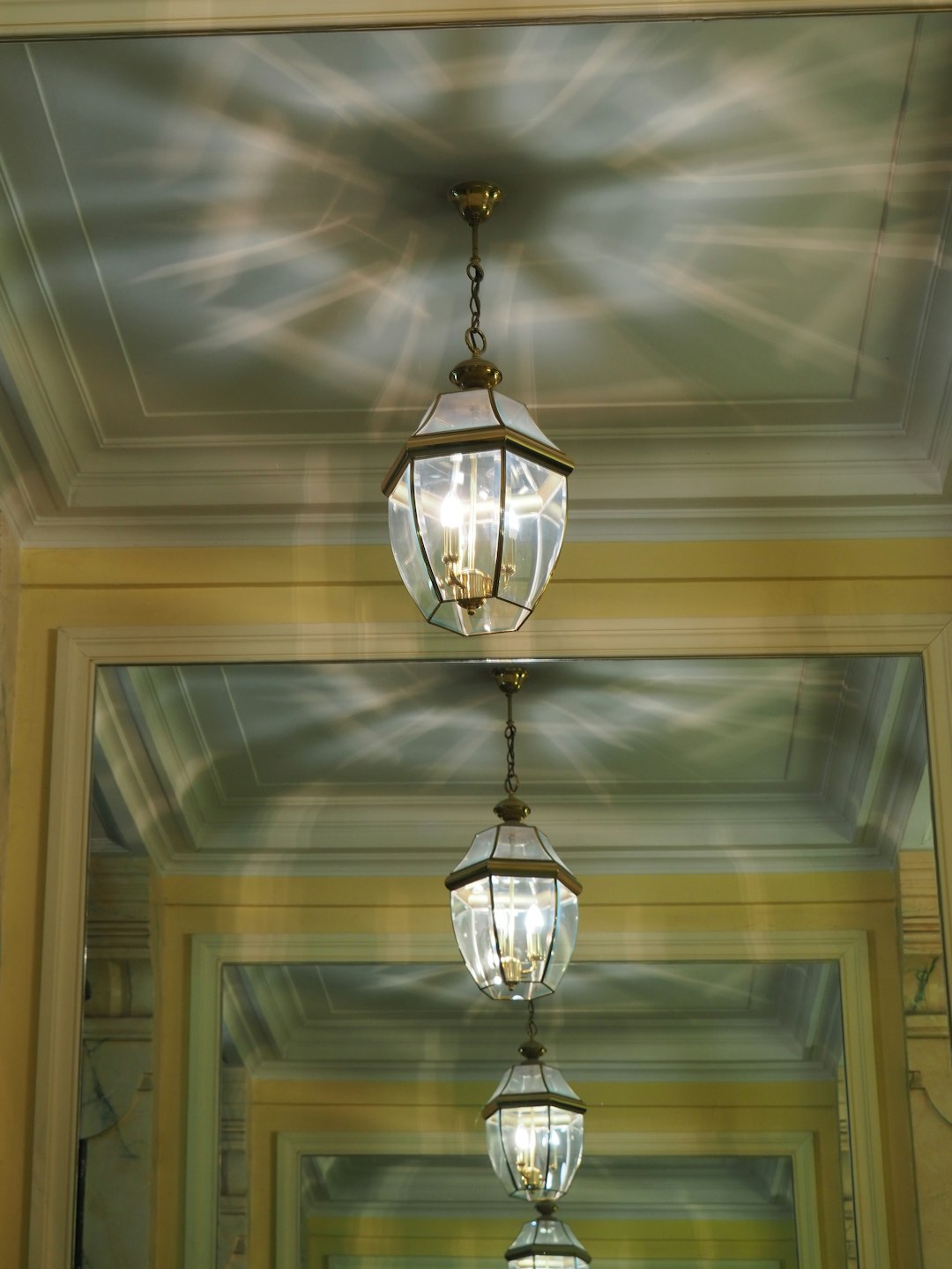 silver and gold pendant lamp