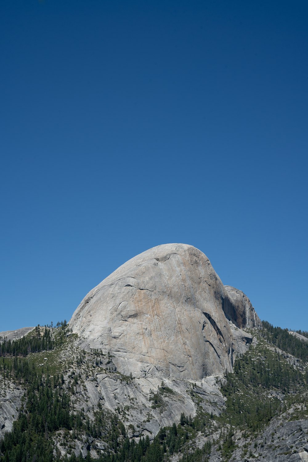 gray rock formation under blue sky during daytime