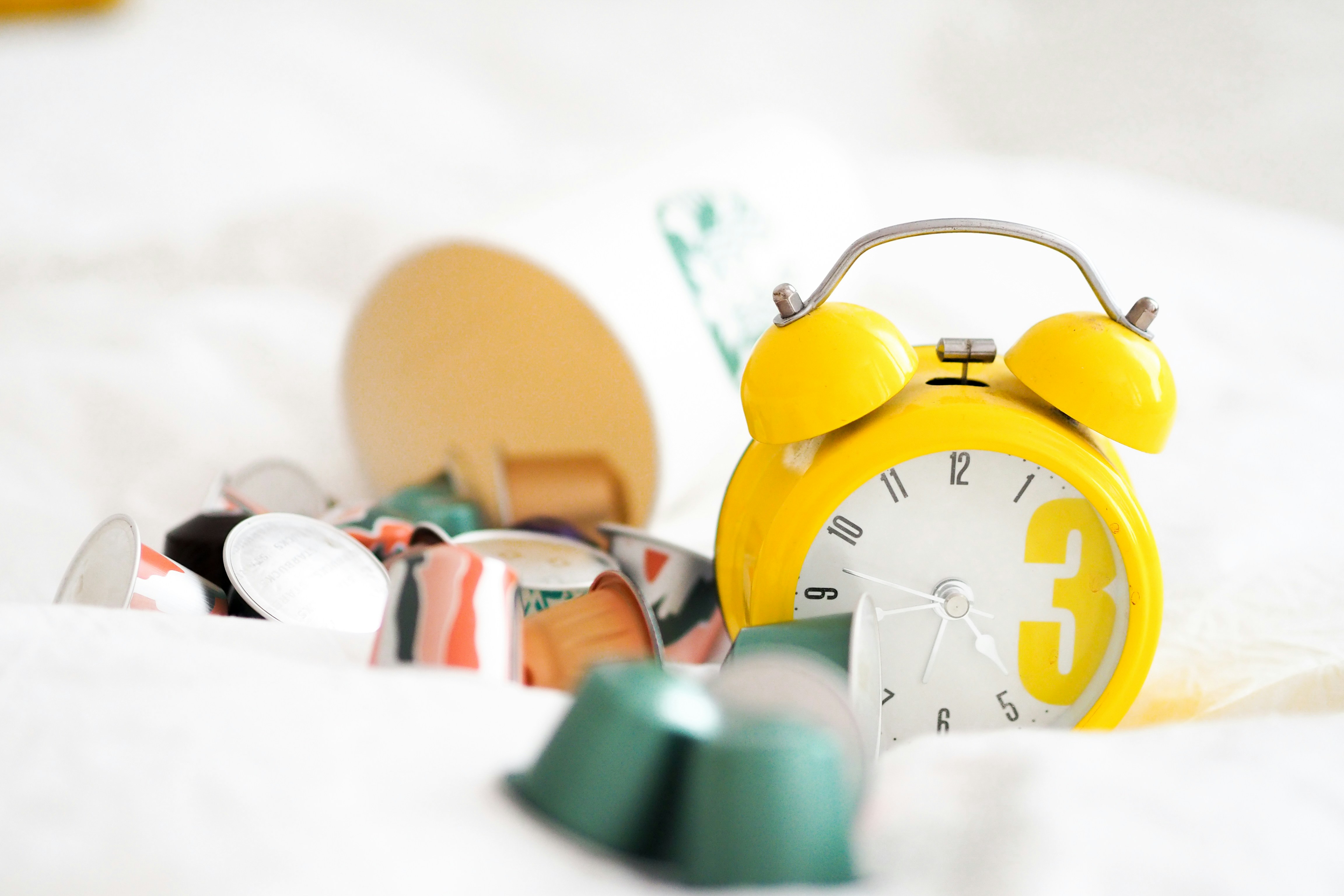 yellow alarm clock at 10 00