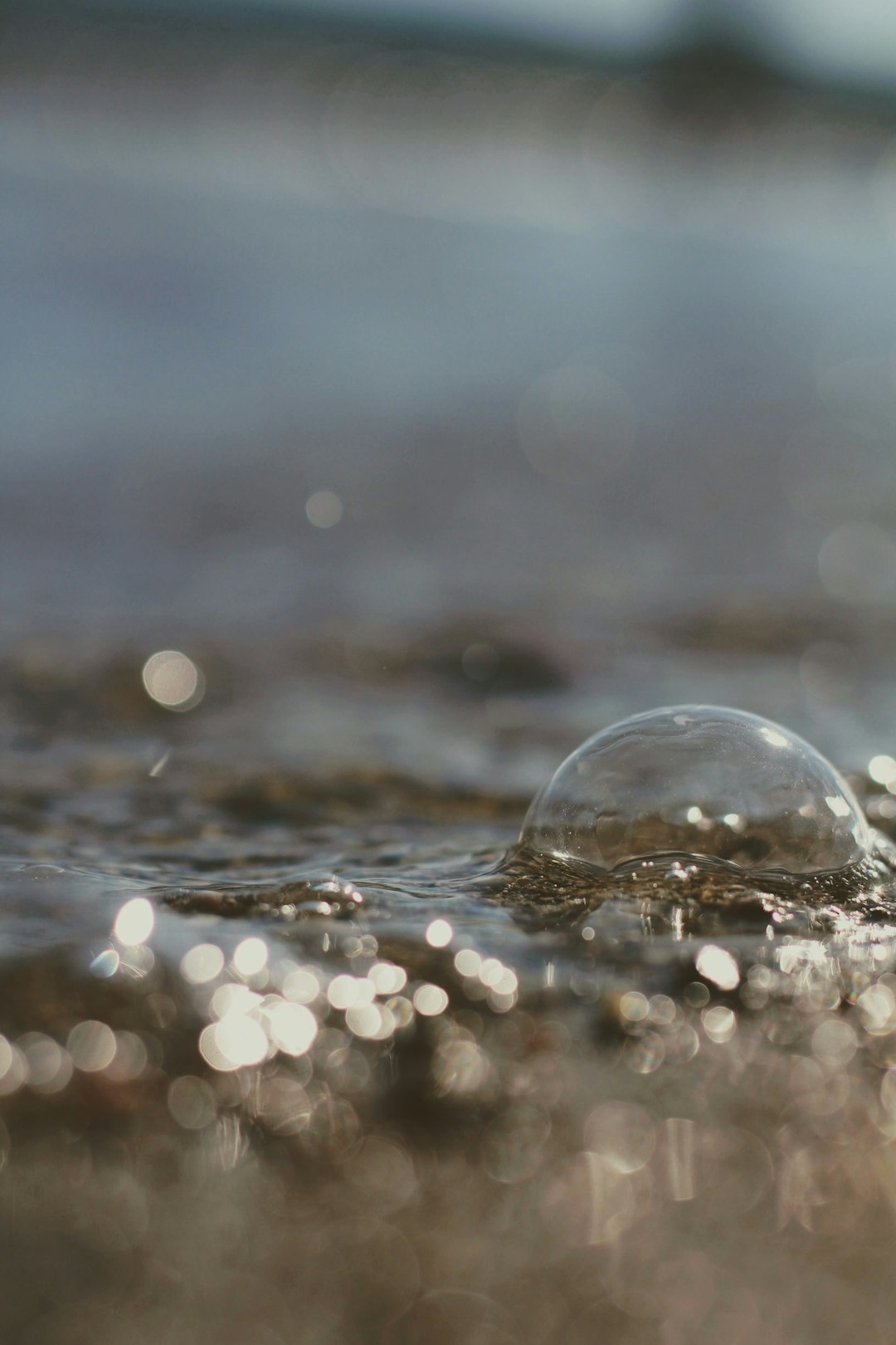 water droplets on body of water