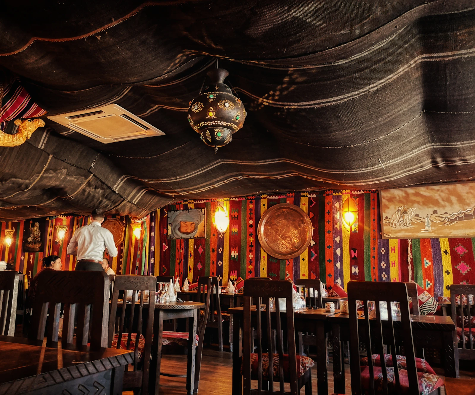 Guests dining together inside the restaurant