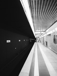 grayscale photo of train station
