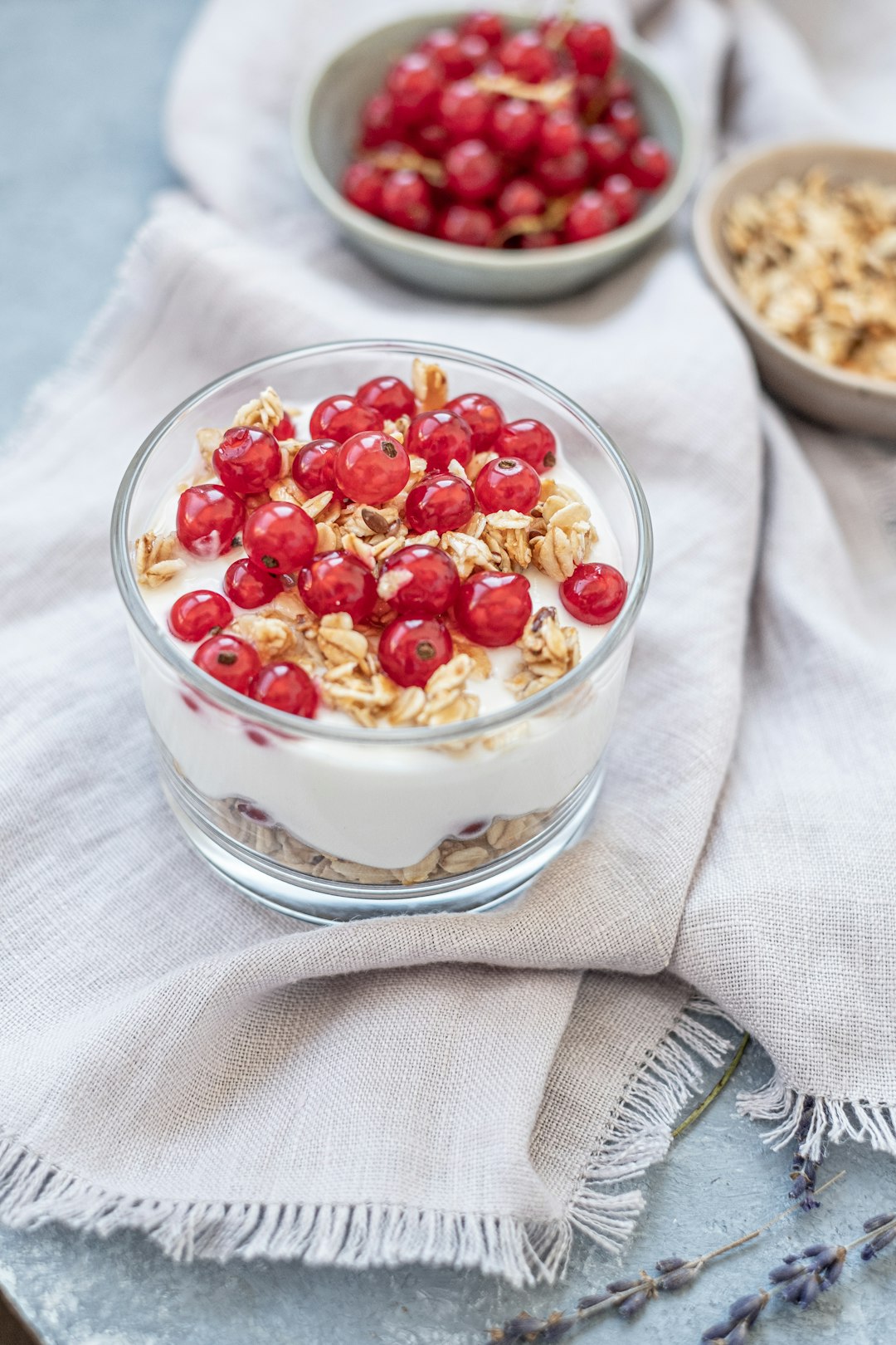 clear glass bowl with red and white berries