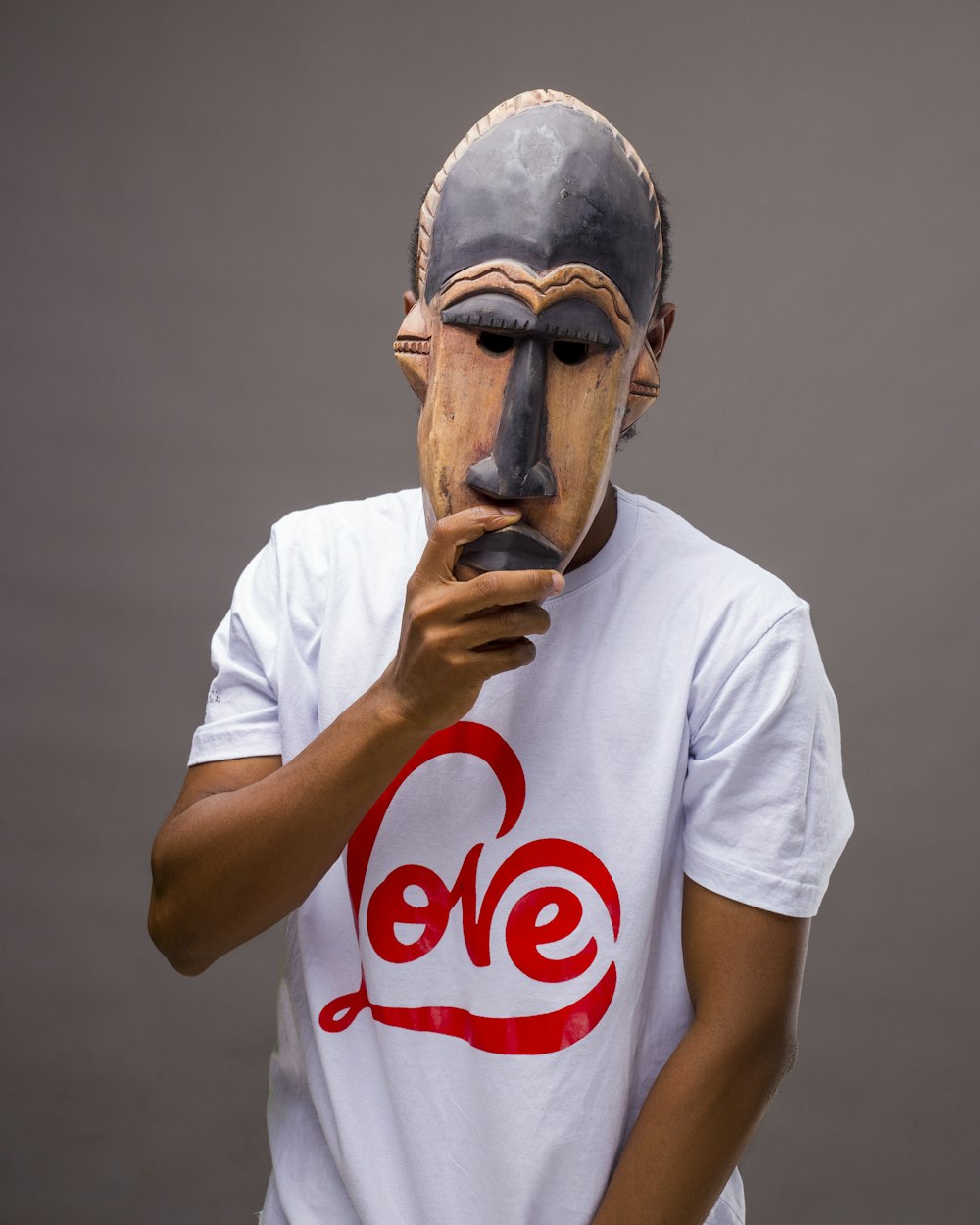 man in white crew neck t-shirt with face paint