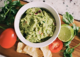 green soup in white ceramic bowl