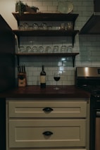 Charming kitchen nook with rustic wooden shelves and colorful accents