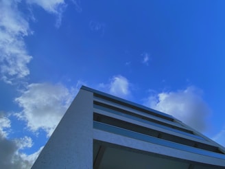 Exterior shot of a commercial property captured with sharp detail against a bright blue sky.