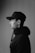 man in black hat and coat