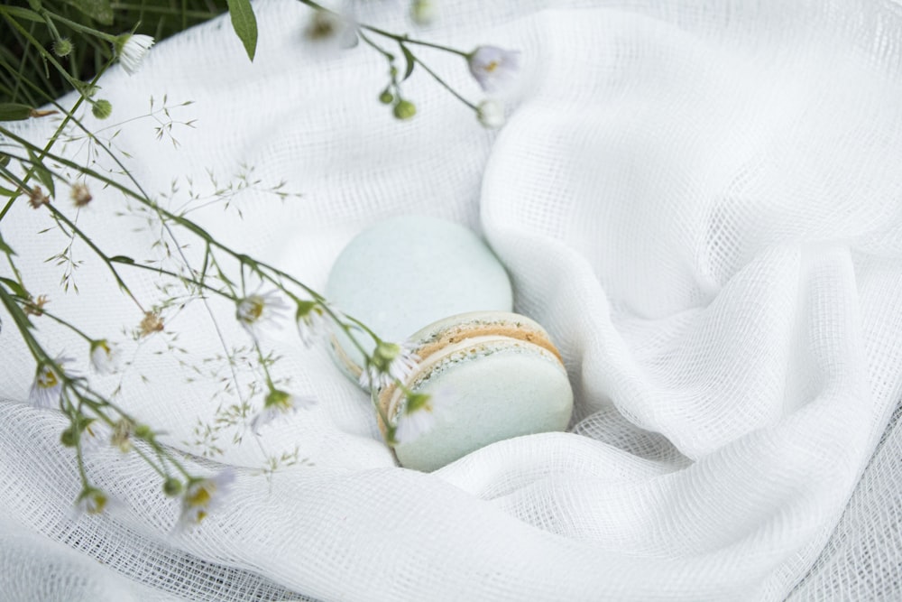 white egg on white textile