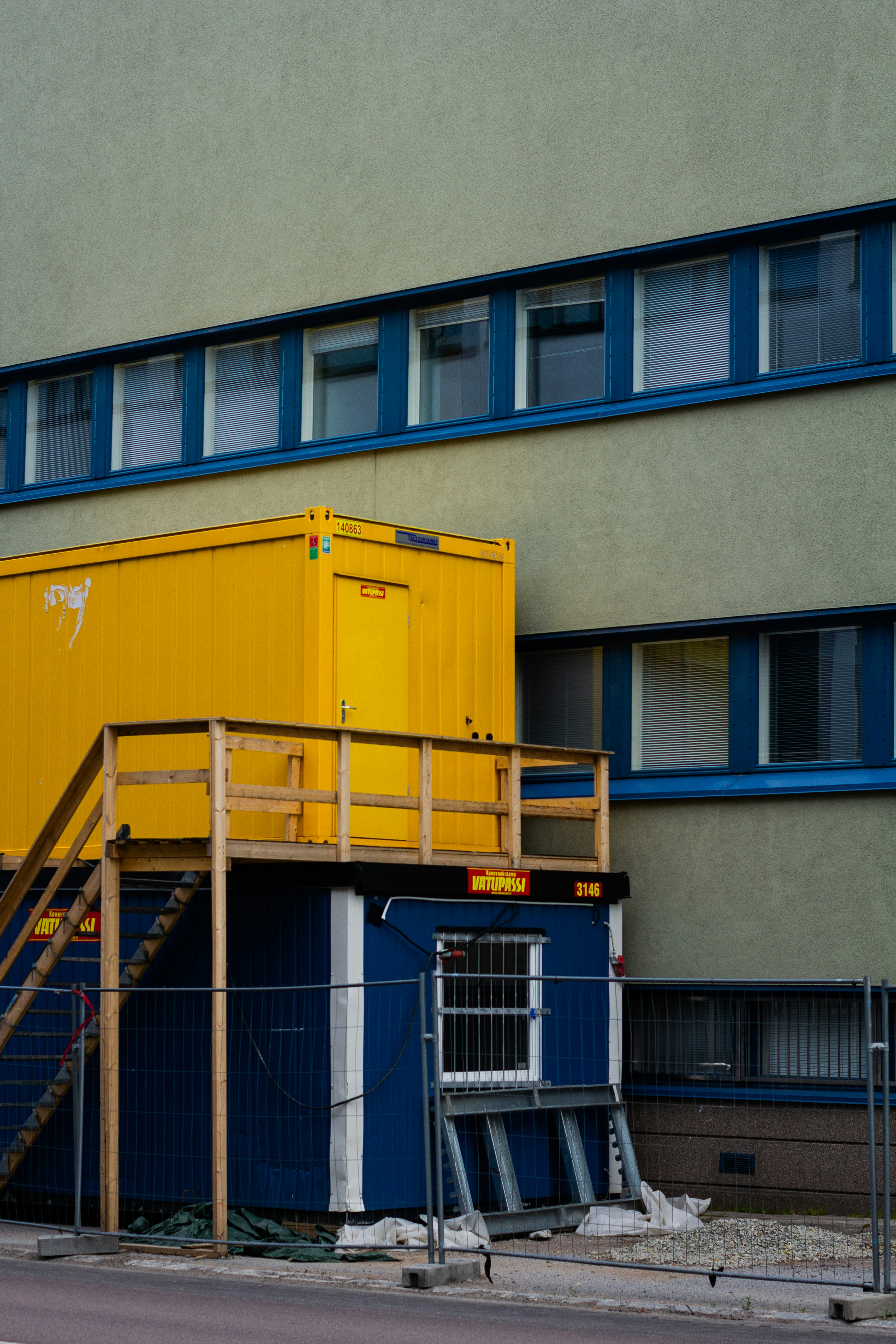 yellow and blue steel fence