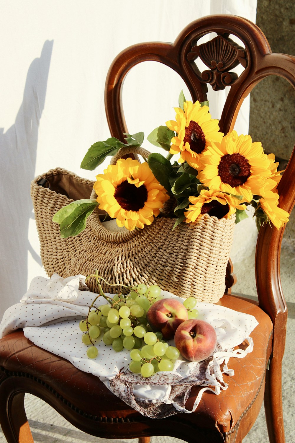yellow flower bouquet on brown woven basket