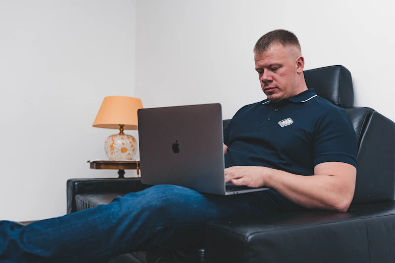 Generous sugar daddy working on his MacBook