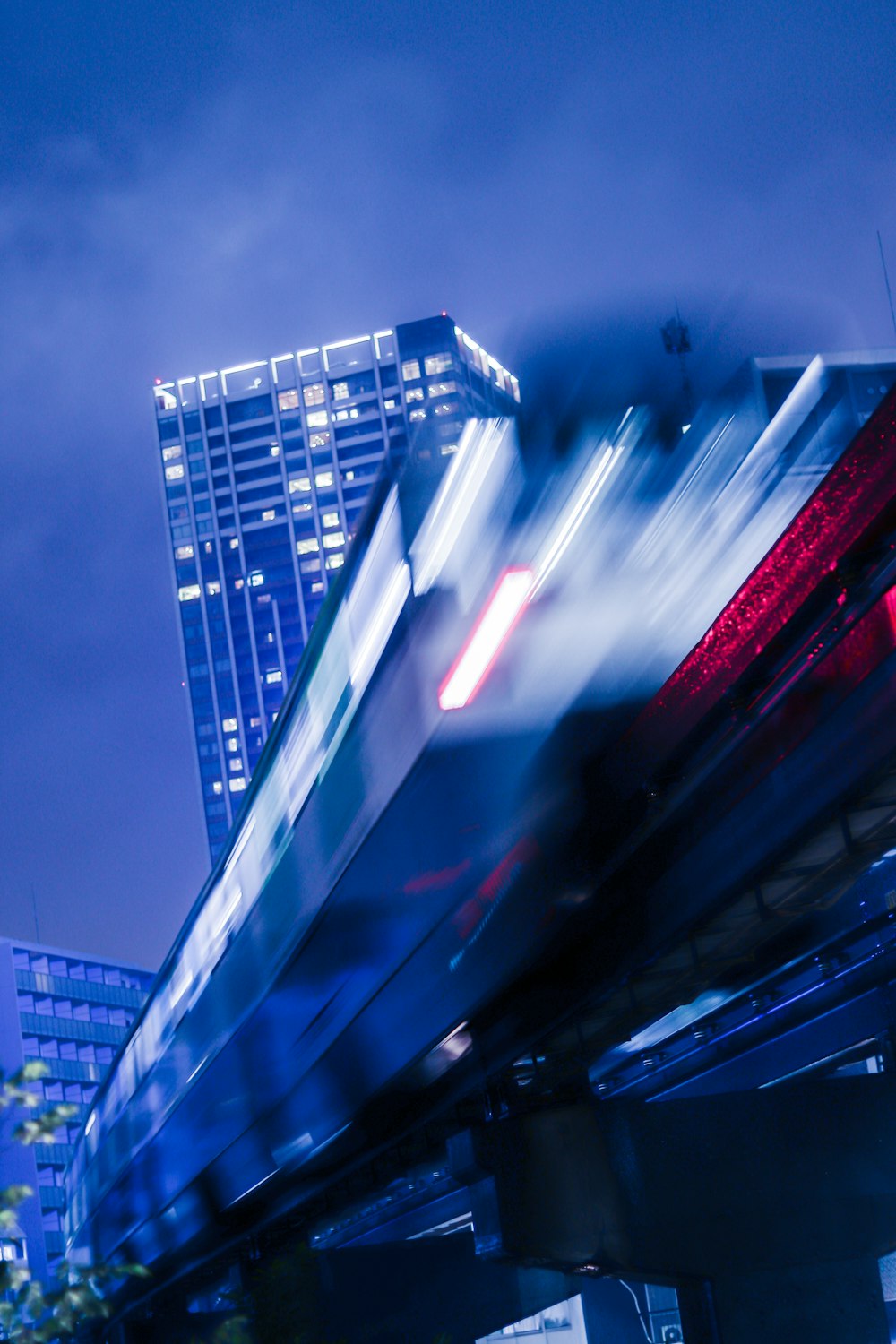 blue and white building during night time