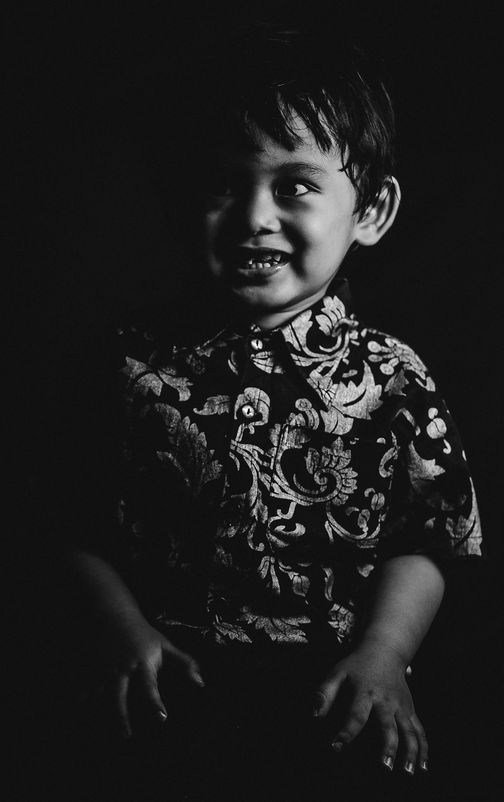 grayscale photo of boy in crew neck t-shirt