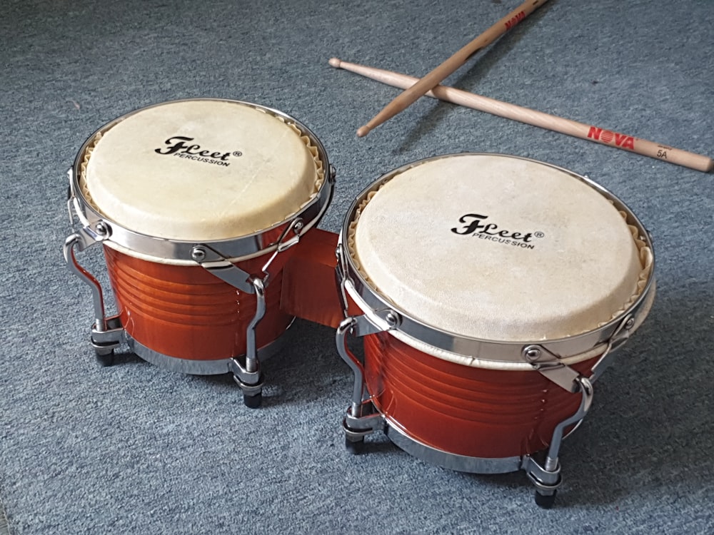 brown and white drum set