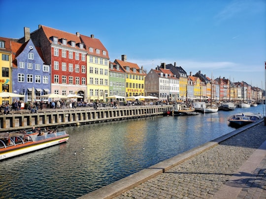 boat on dock near buildings during daytime in Mindeankeret Denmark