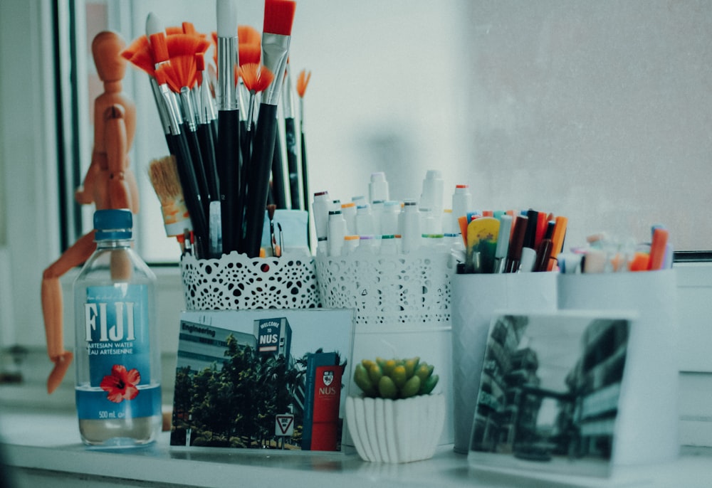 white plastic container on glass shelf