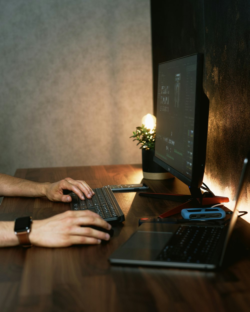 person using black laptop computer