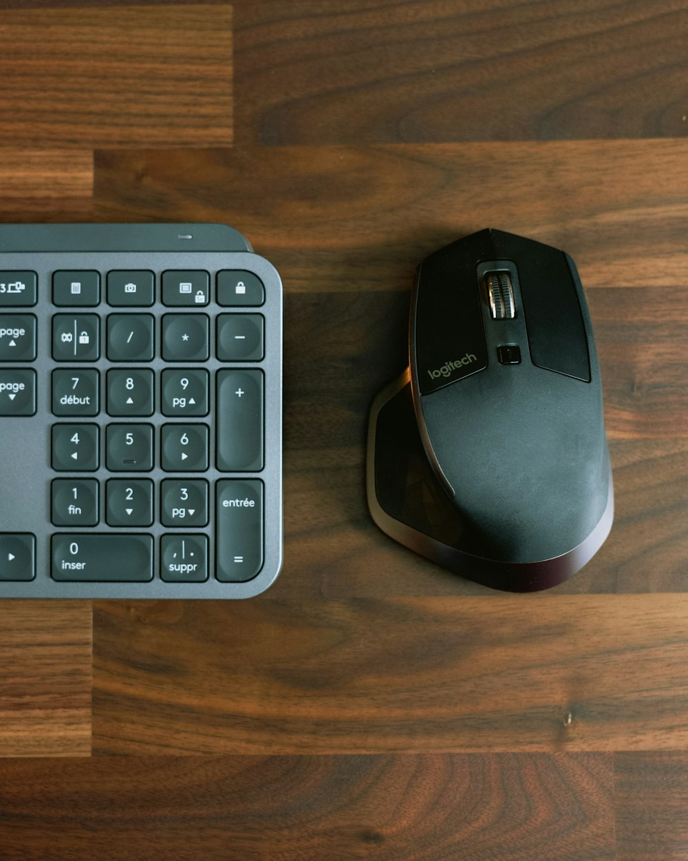 black and gray logitech cordless computer mouse