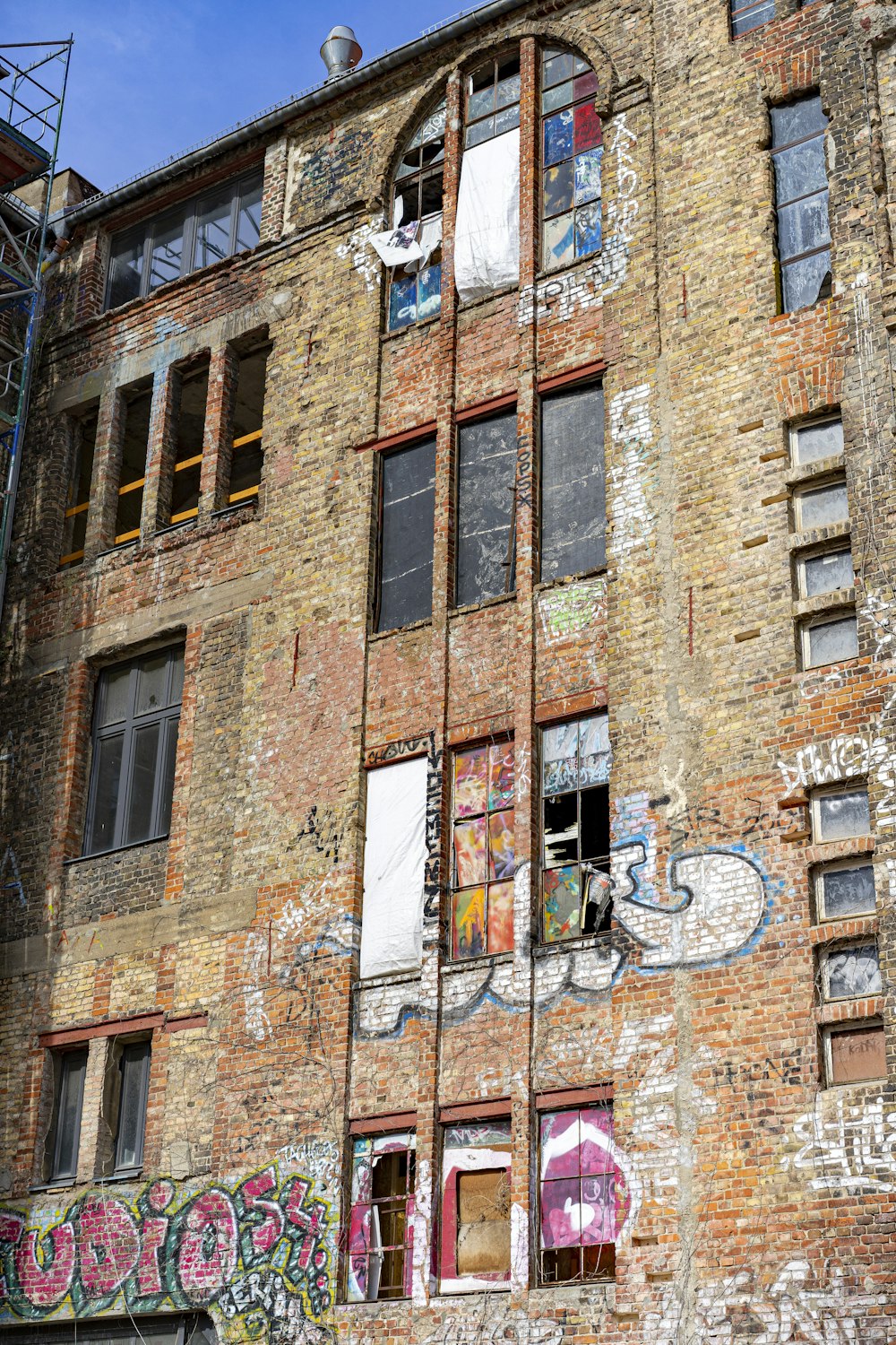 brown brick building with glass windows