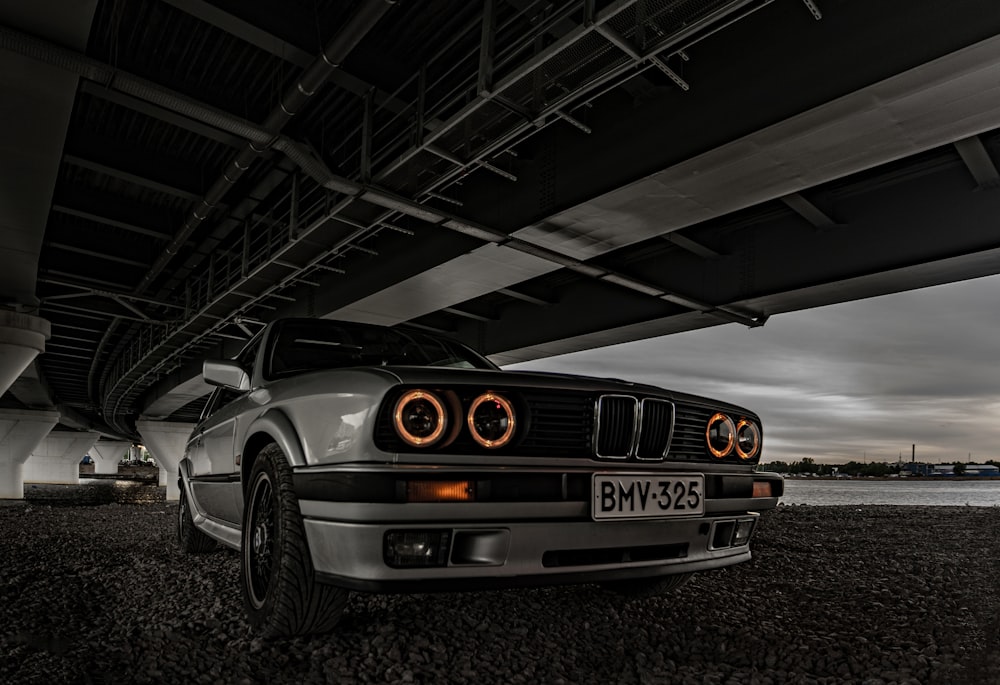 white and black bmw m 3 coupe