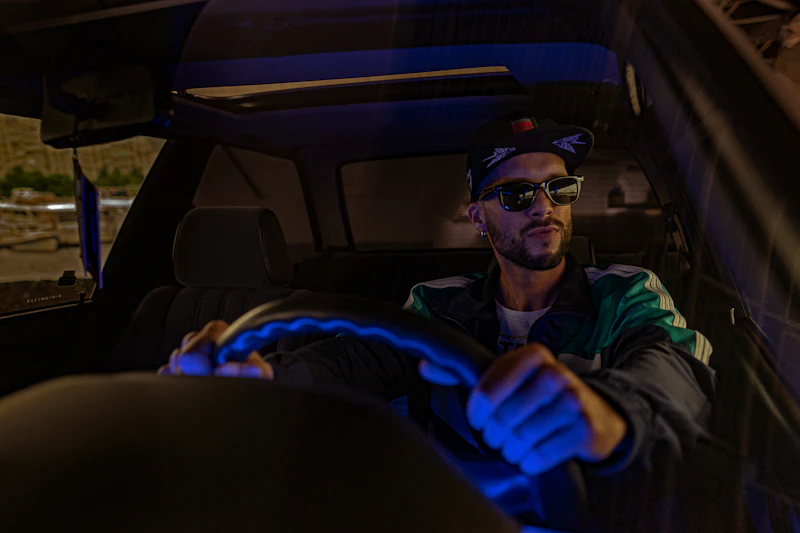 Driver in car at night