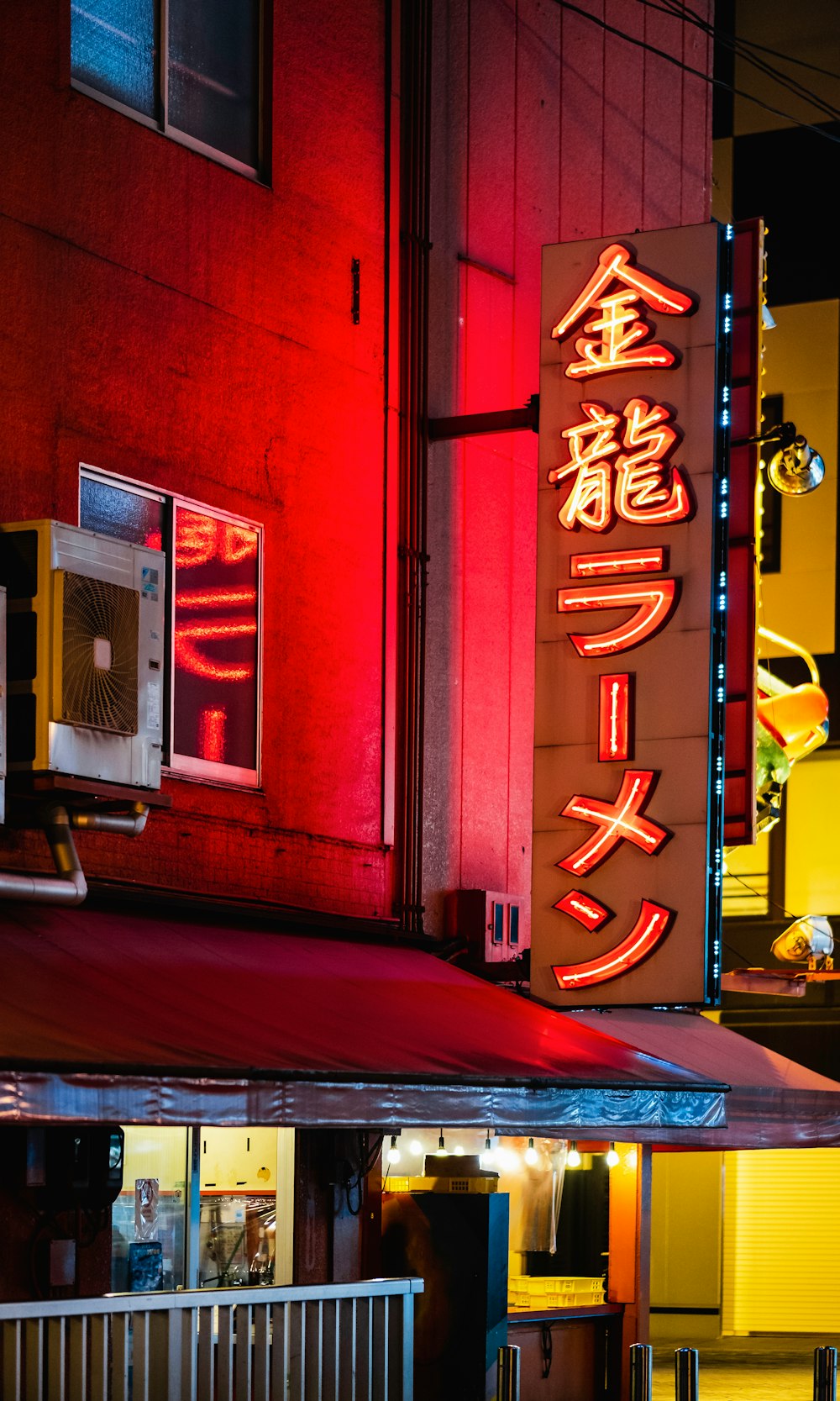 red and yellow love neon light signage