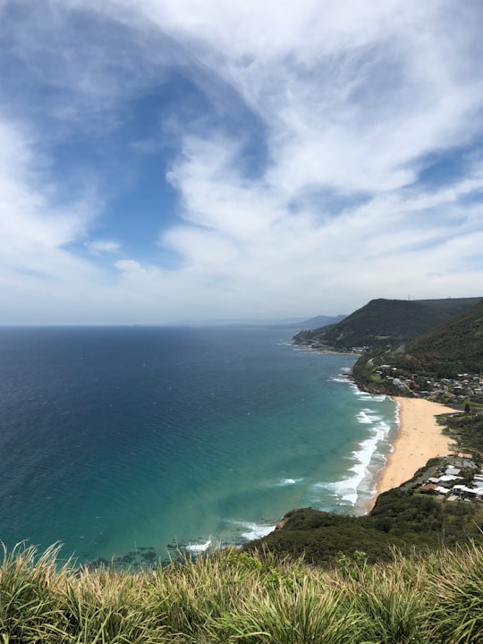 green mountain beside blue sea under blue sky during daytime in Bald Hill Australia