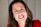 woman in red shirt smiling