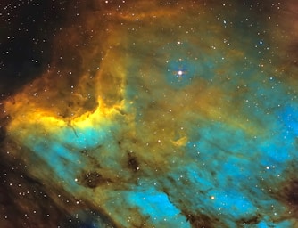 astrophotography,how to photograph ic5070 pelican nebula.  i used a meade 130apo, with a qhyccd 268c mounted on a cgem equator.  the talbot effect is due to the application of the hα oiii sii filter, plus the diffraction from ir glass at 1600mm focal length.; blue brown and yellow abstract painting