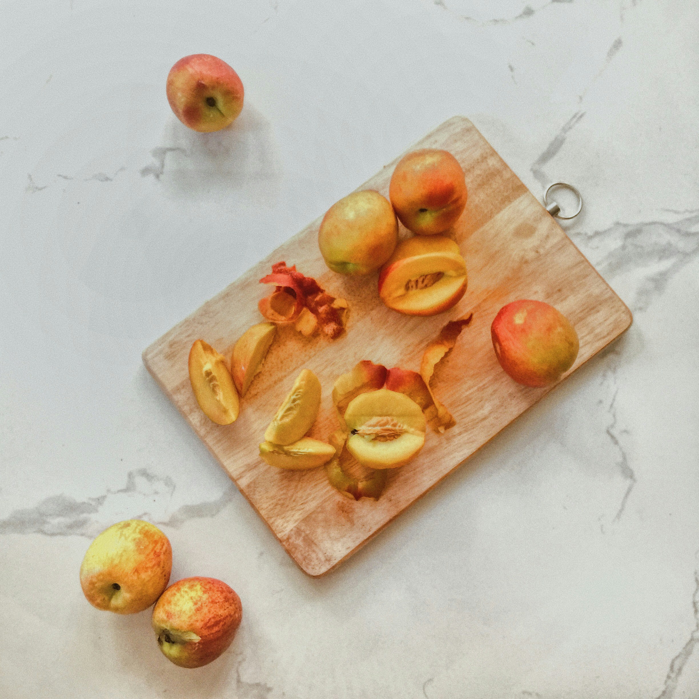 Apple fruit on brown chopping board