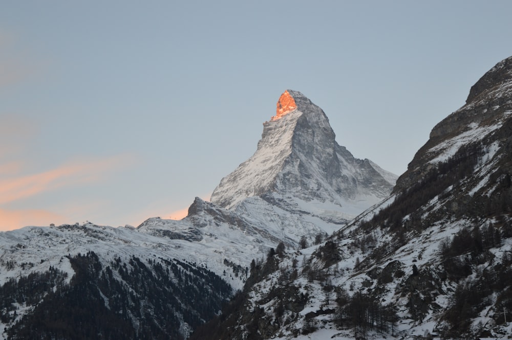 snow covered mountain during daytime