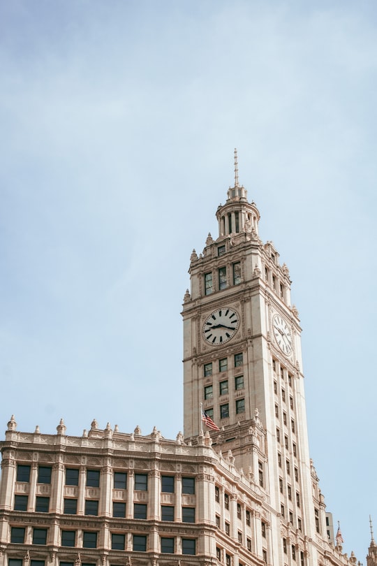 big ben under white sky during daytime in Wrigley Building United States