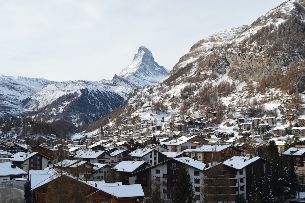 snow covered mountain during daytime