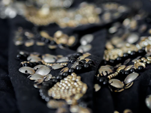 Close-up of handcrafted Missouria beadwork showcasing intricate patterns inspired by nature.