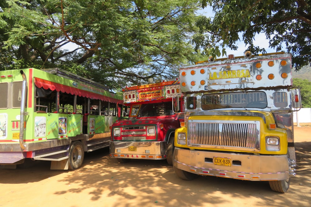 red and yellow bus on road during daytime