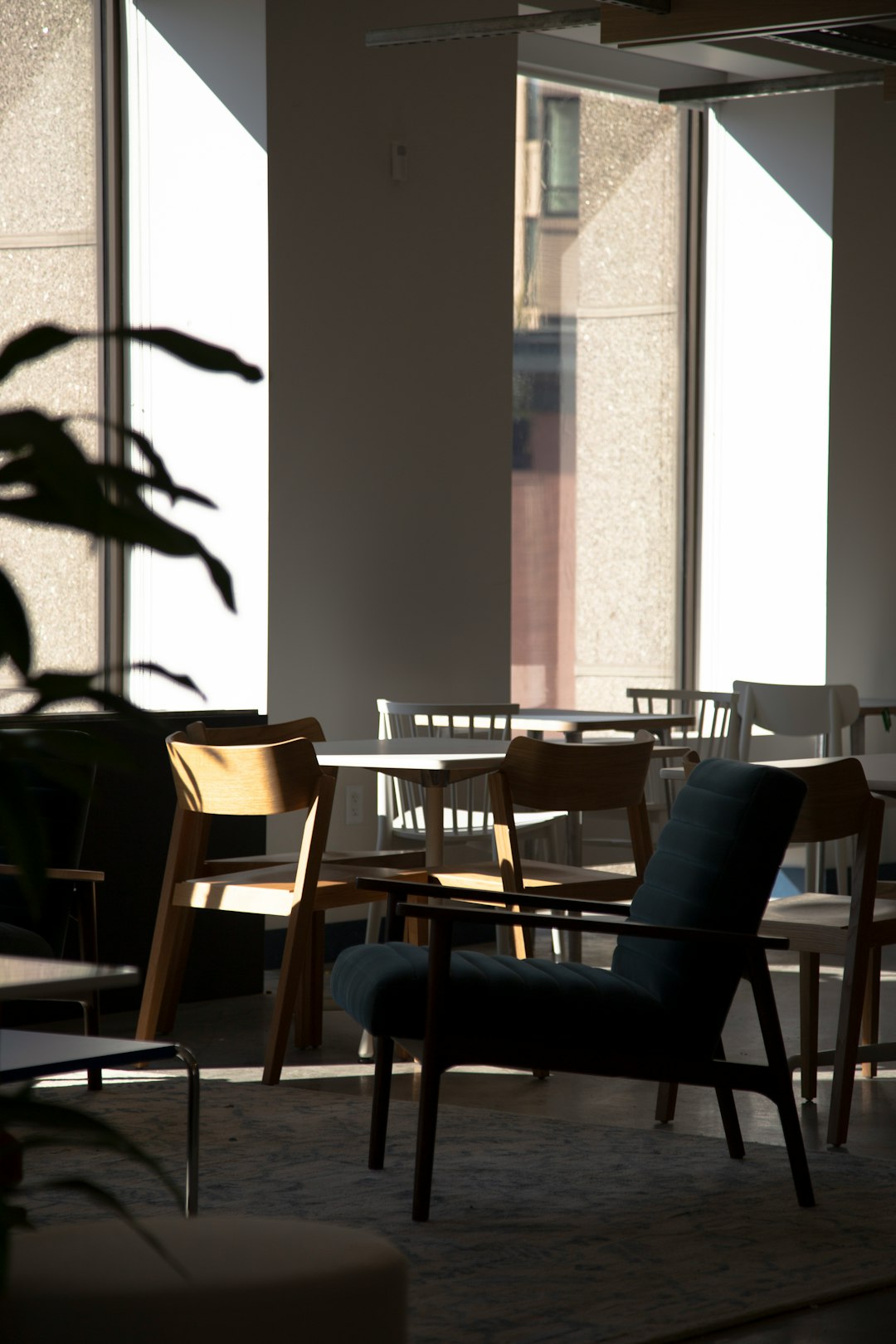 black and brown wooden table and chairs