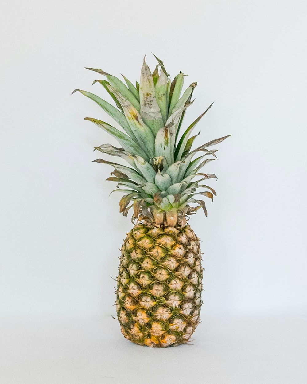 pineapple fruit on white surface