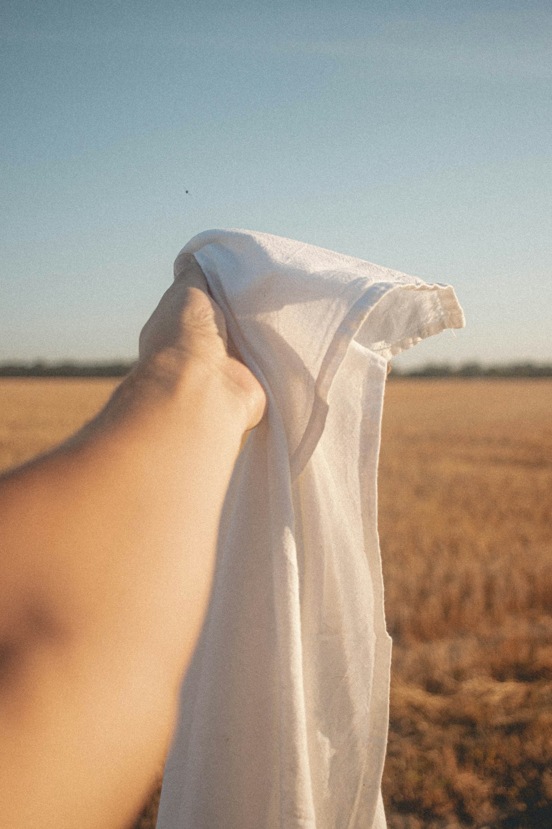 person covered with white textile