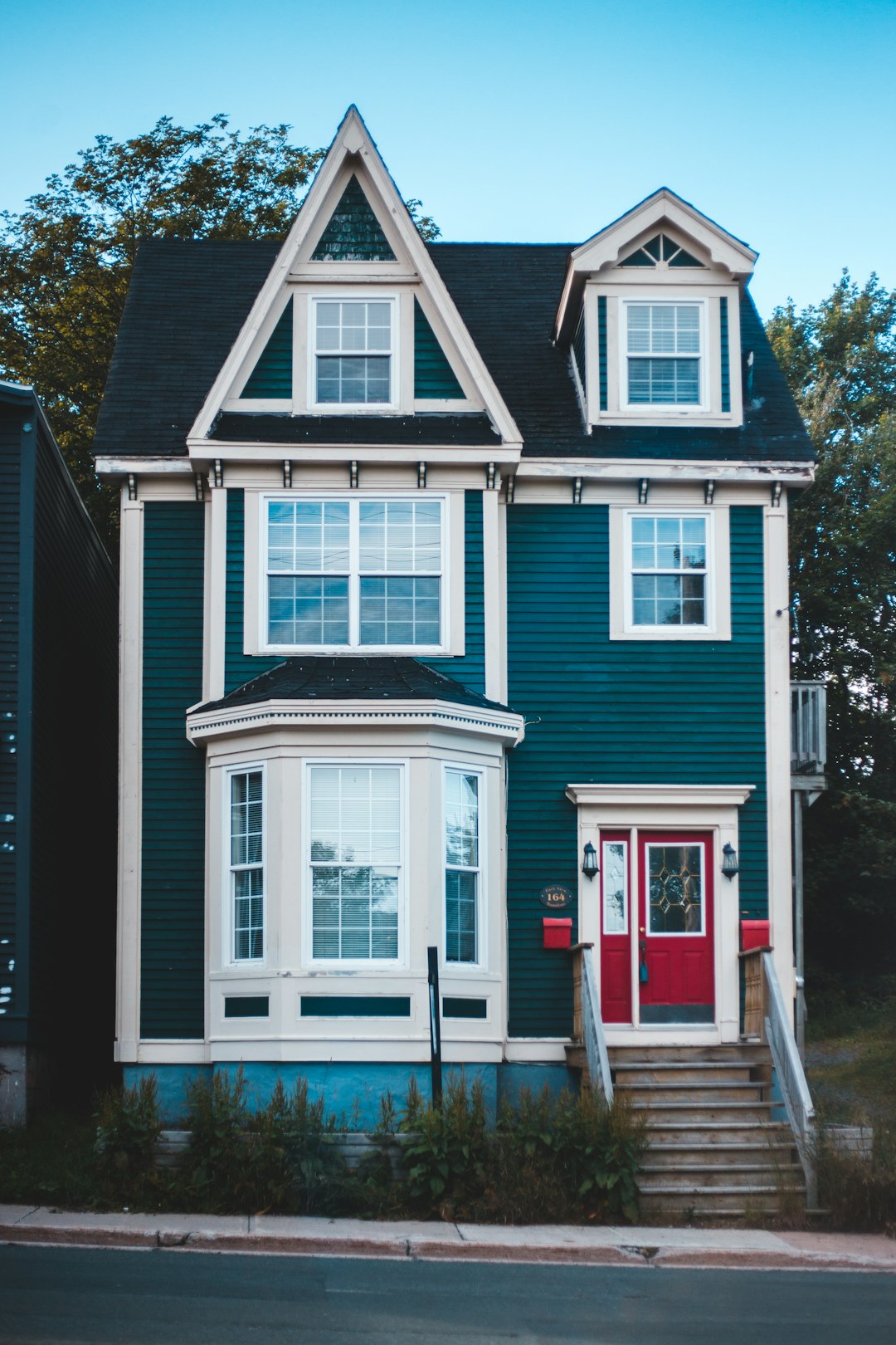 white and blue wooden house