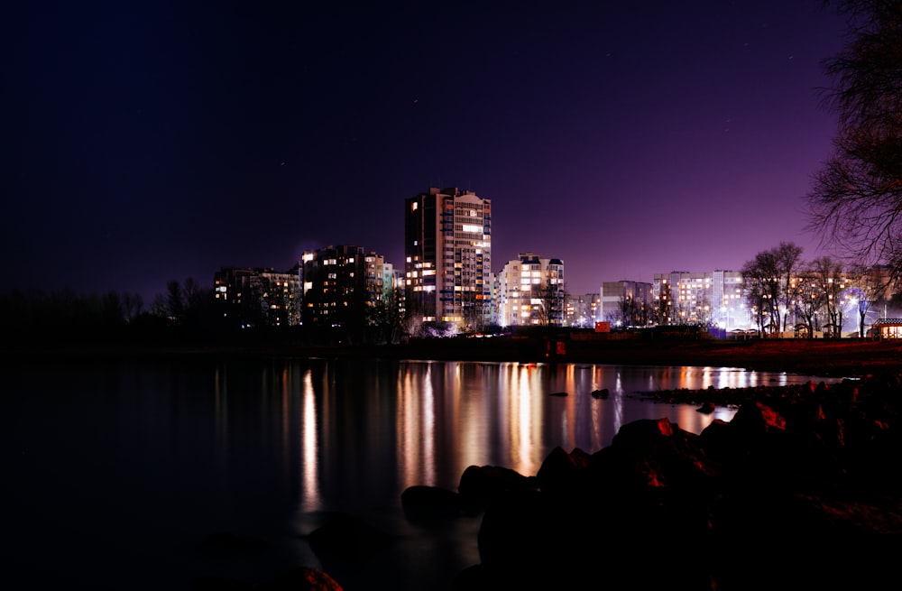 city skyline during night time