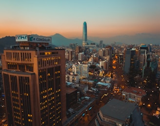 city with high rise buildings during night time