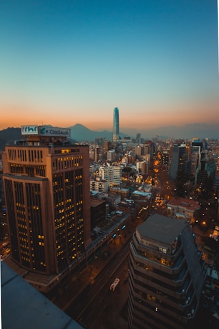 city with high rise buildings during night time