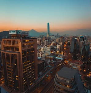 city with high rise buildings during night time