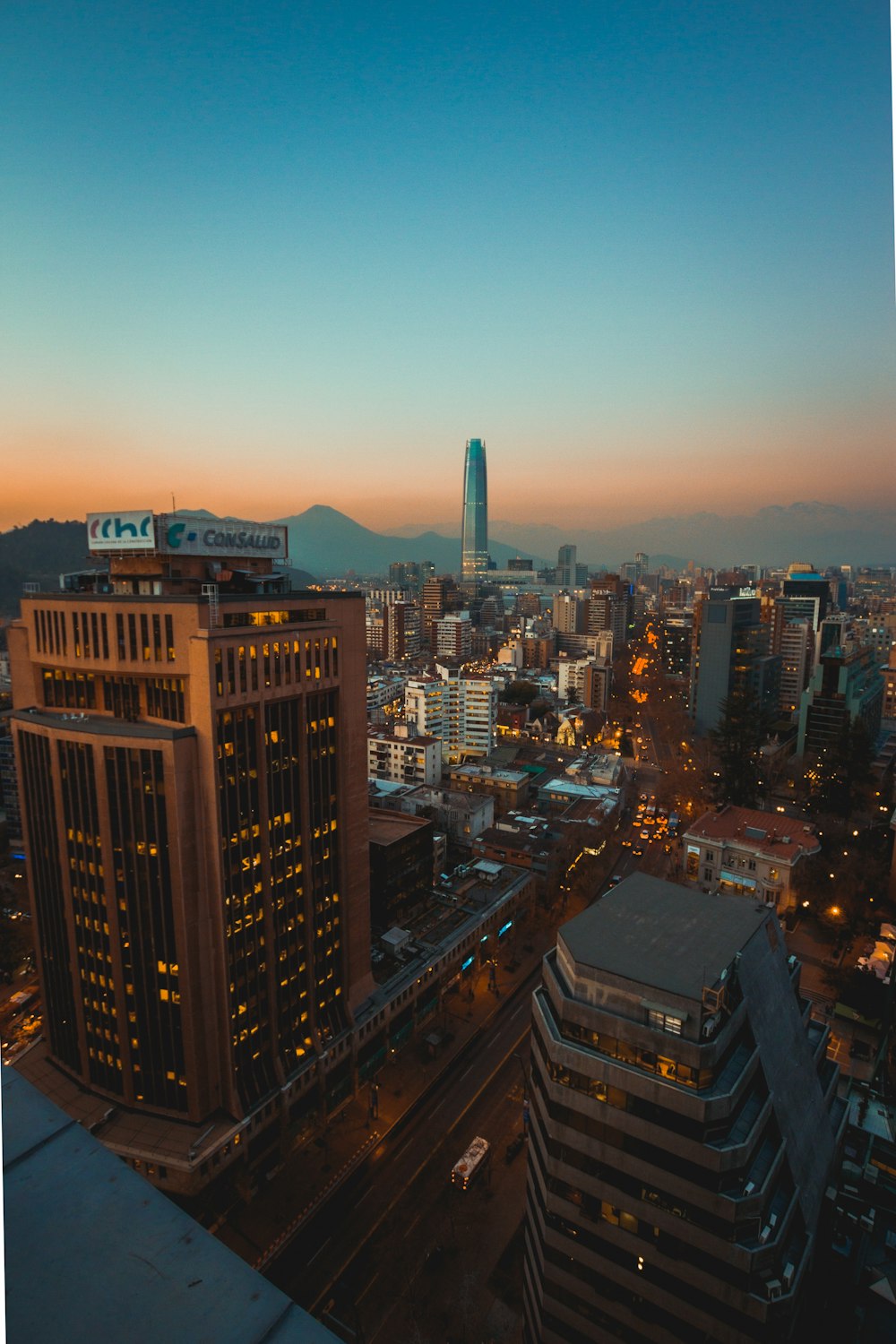 city with high rise buildings during night time