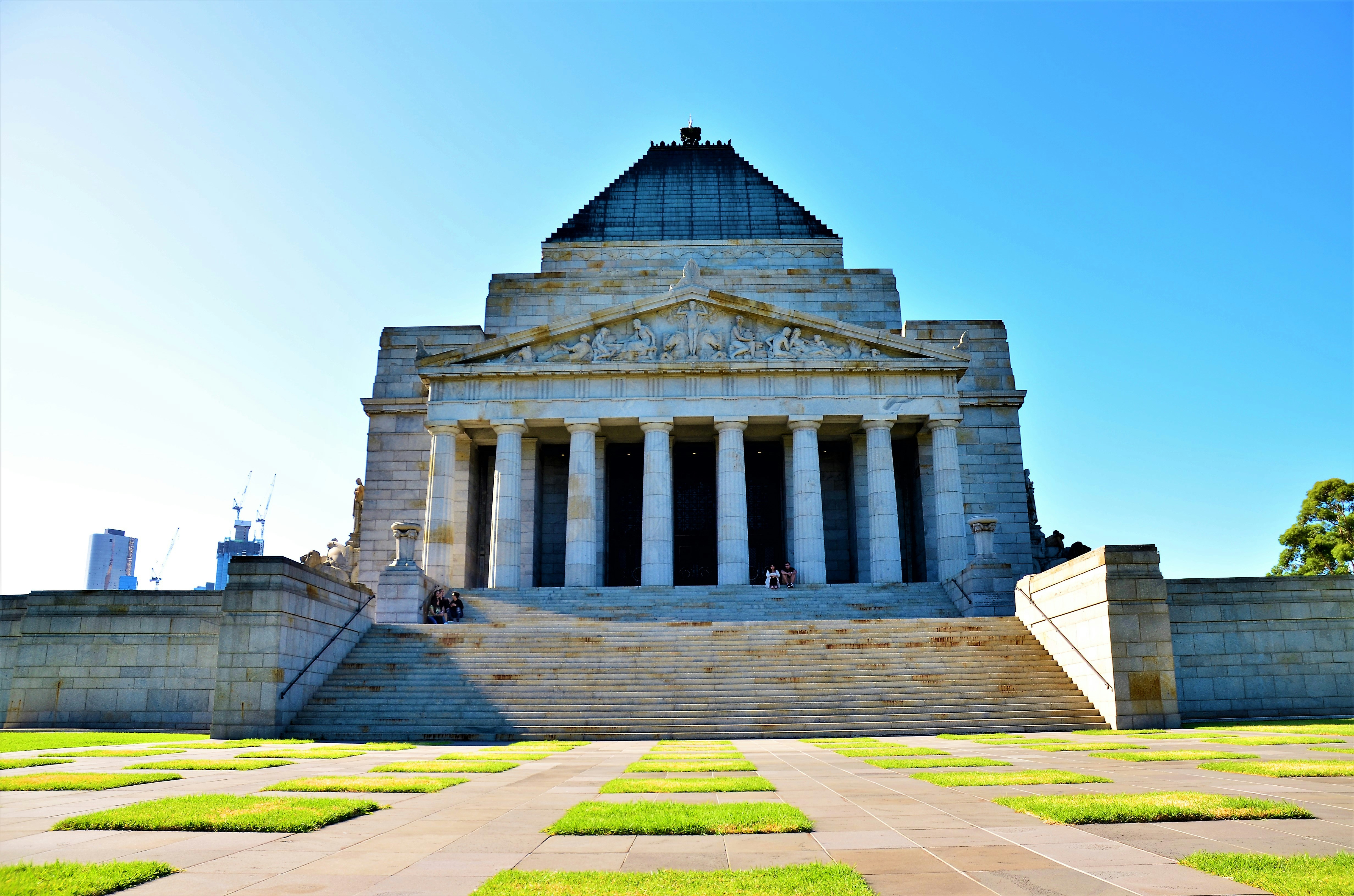 white concrete building under blue sky during daytime