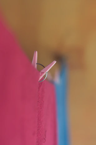Close-up of the zenvetix sensor clip attached to pajamas fabric.