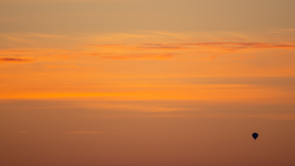 orange and blue sky during sunset